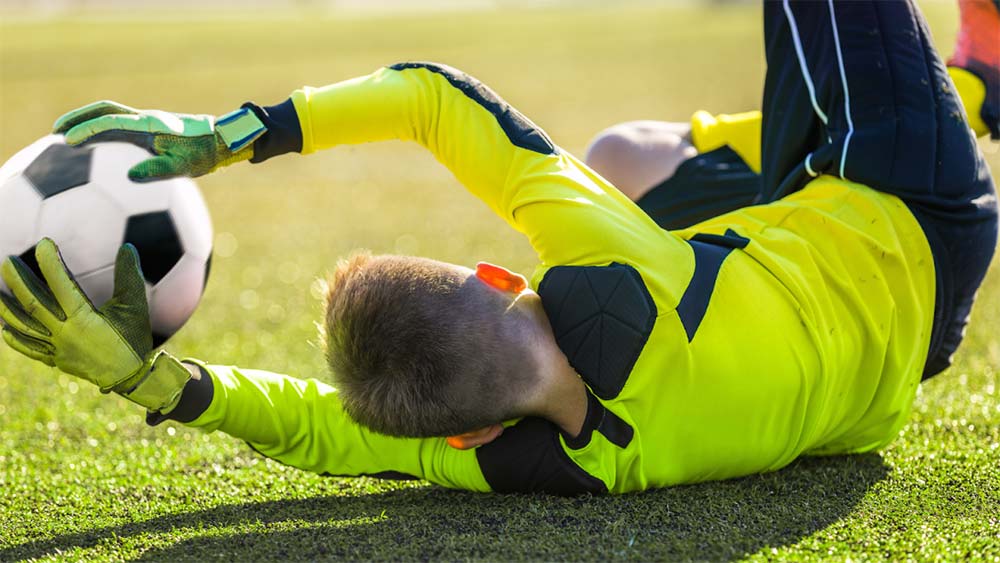 soccer goalkeeper with ball